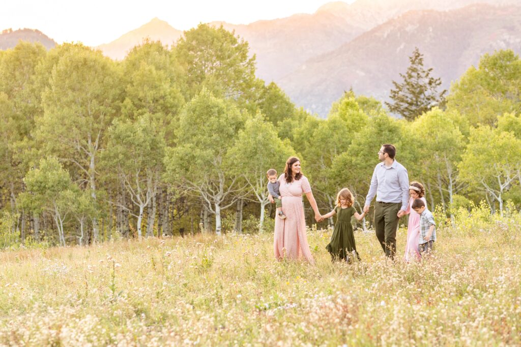 family walking in American Fork Canyon during sunset